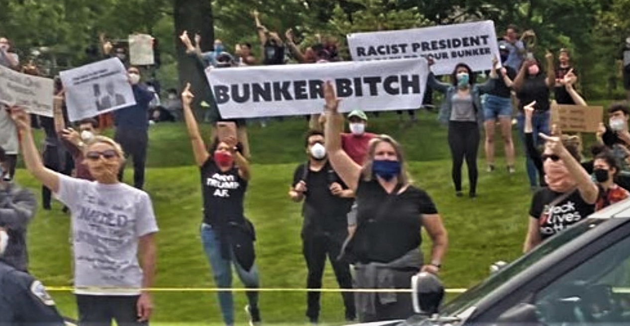 Trump Just Drove Through A Sea Of Middle Fingers, ‘Bunker Bitch’ Sign On Way To Photo-Op